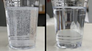 Epoxy resin bubble test with clear cups for flower preservation
